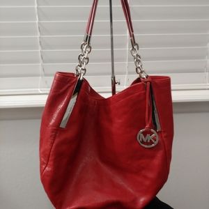 Red Michael Kors purse bag silver hardware.